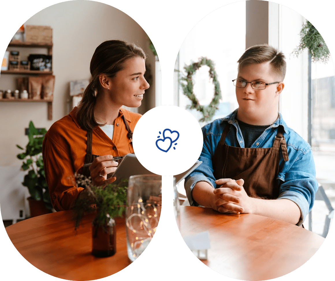 Two people enjoying drinks and conversation in a cozy kitchen.